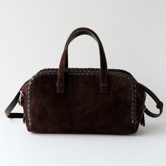 Structured cowhide leather handbag with suede body and woven leather trim — BAGZLY