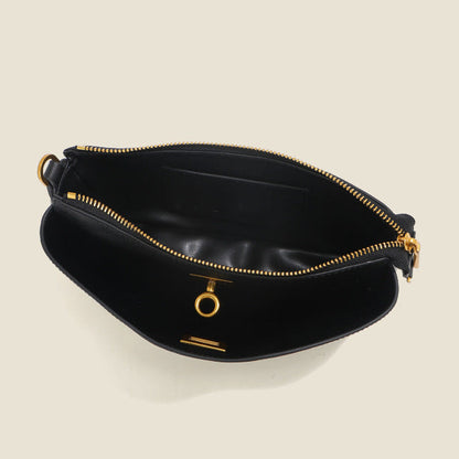 The Turn Lock Shoulder Bag