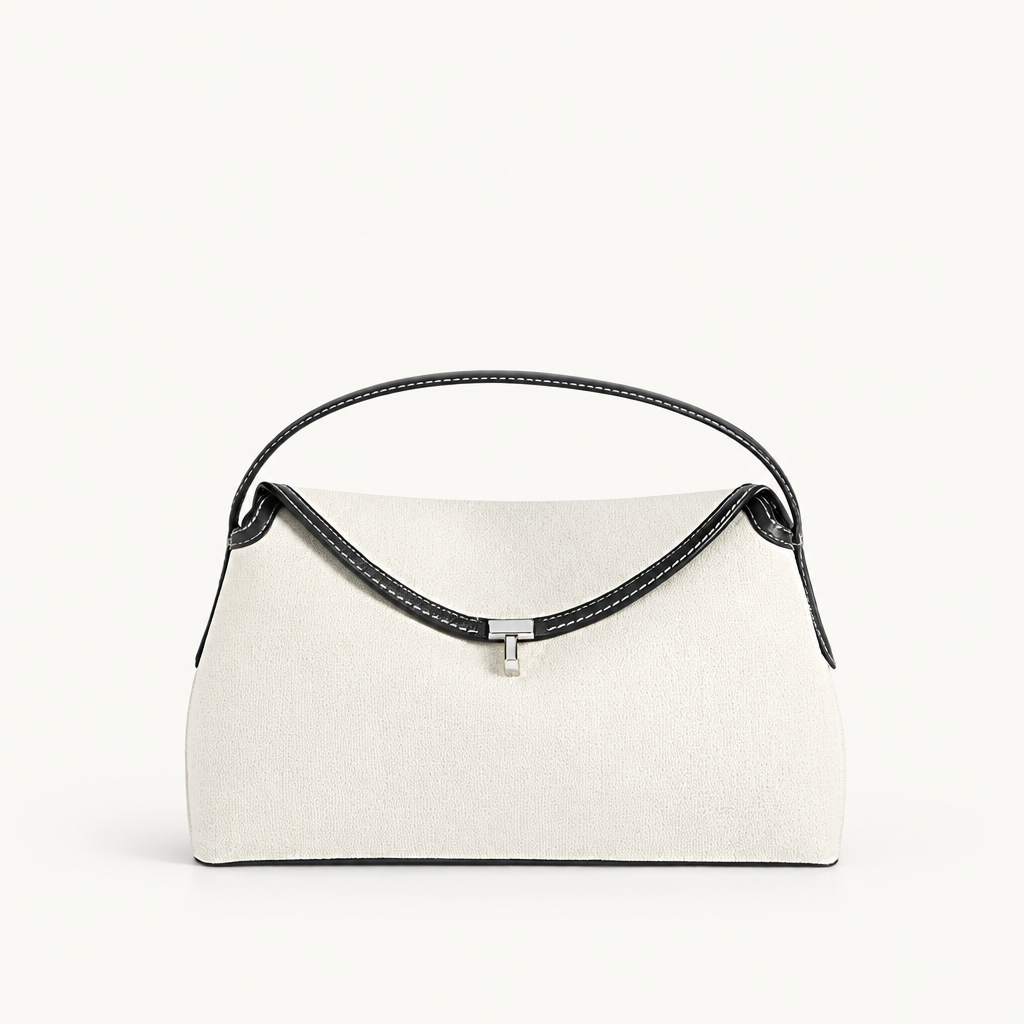 Cream bag with black handle