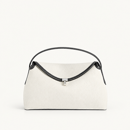 Cream bag with black handle